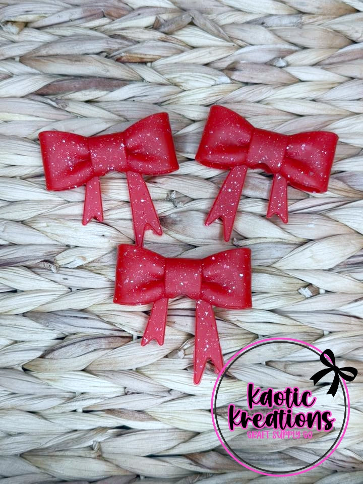 D82 BEADABLE JUMBO SILICONE BOW RED CONFETTI GLITTER (1ct)
