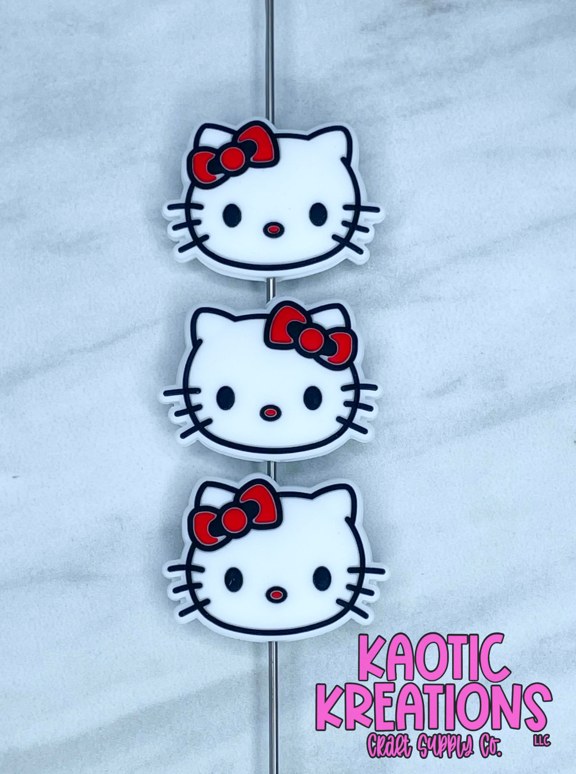 RED BOW KITTY FACE SILICONE FOCAL D71 (1ct)