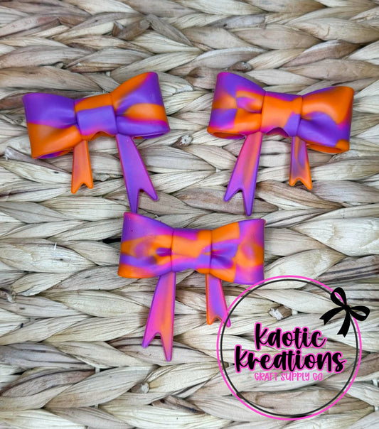 D74 BEADABLE JUMBO SILICONE BOW ORANGE/PINK/PURPLE SWIRL (1ct)