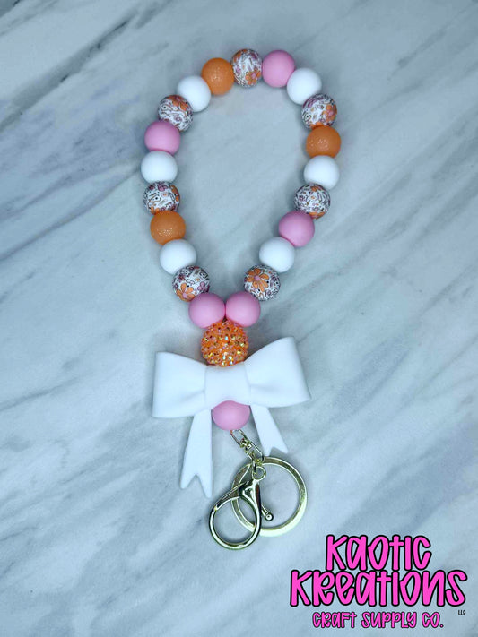 PRE-MADE TEARDROP BEADED WRISTLET W/WHITE JUMBO BOW