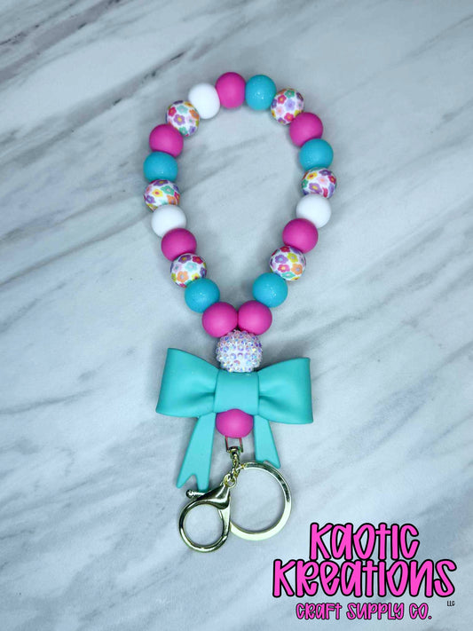 PRE-MADE TEARDROP BEADED WRISTLET W/TEAL JUMBO BOW